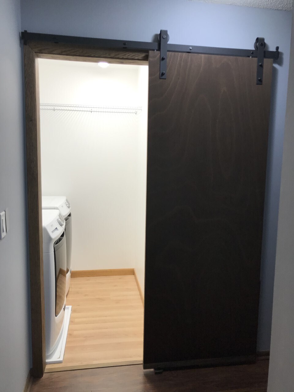 Main level laundry with barn door - 1A Golden Oak Dr
