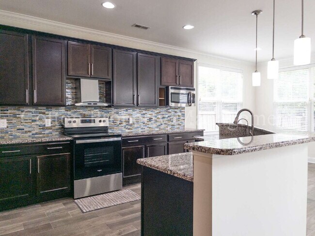 Building Photo - 7445 Darius Dr