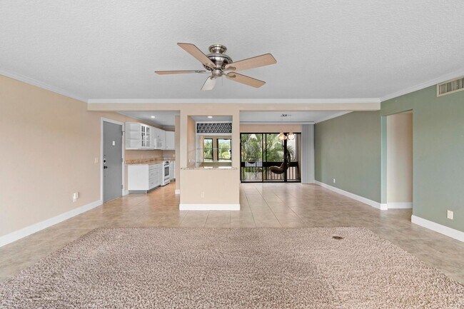 Building Photo - Lakefront lifestyle in this stunning 3-bed...
