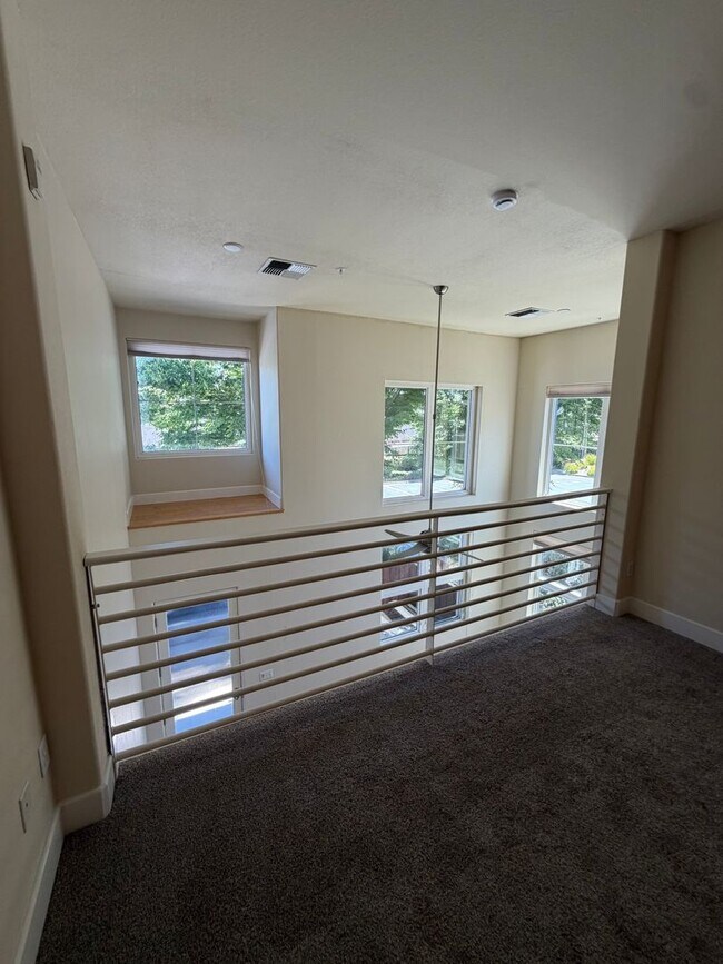 Building Photo - 7034-7046 Santero Way Lofts