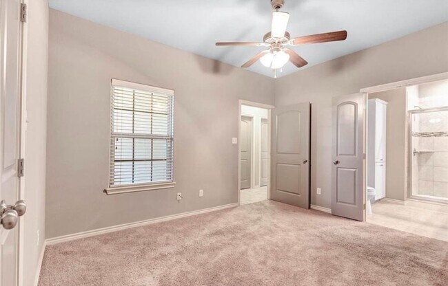 Building Photo - College Station - 3 bedroom / 3 bath Townhome, covered patio & back yard with one car garage.