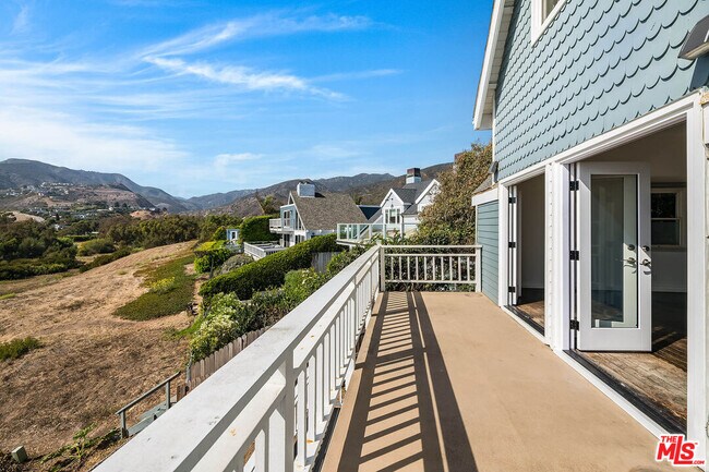 Building Photo - 6457 Surfside Way
