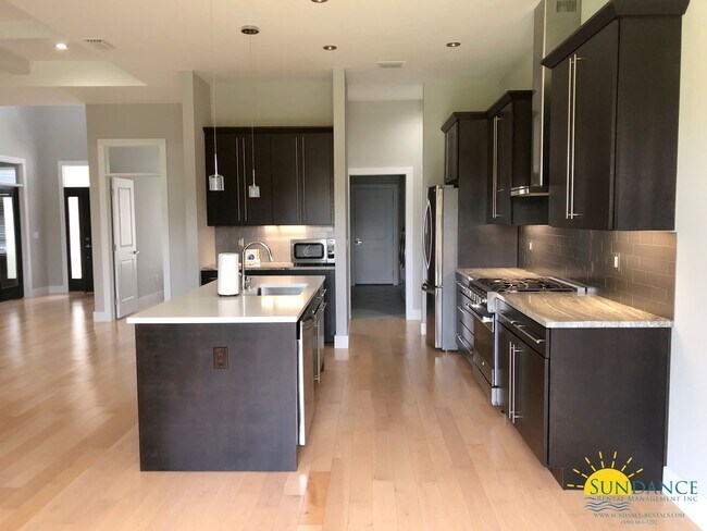 Building Photo - Stunning 4 Bedroom Custom Built Lake Front Home!