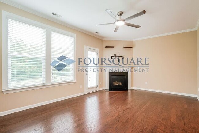 Building Photo - End Unit Townhome | Back Patio With Privac...