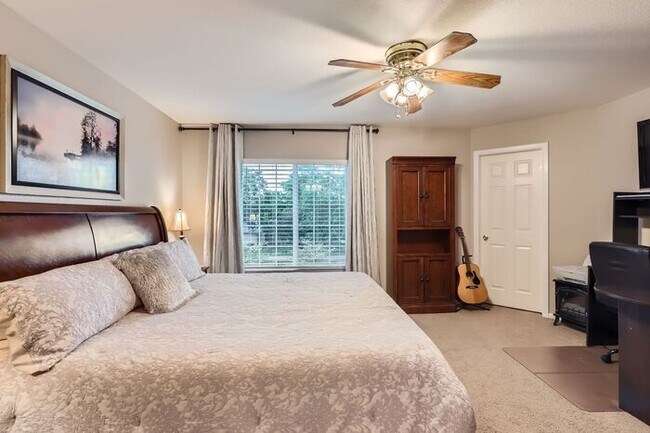 Building Photo - Updated 4-Bedroom with Serene Outdoor Spac...