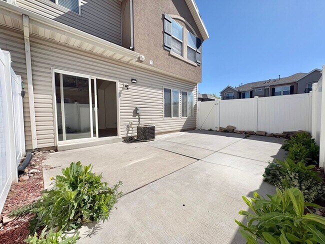 Building Photo - Spacious 3 Bed Townhome in West Valley City with Gated Yard, Garage & Pool