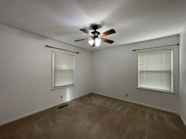 Building Photo - Your New Snyder Sanctuary: Modern Updates, Massive Storage & a Cozy Porch