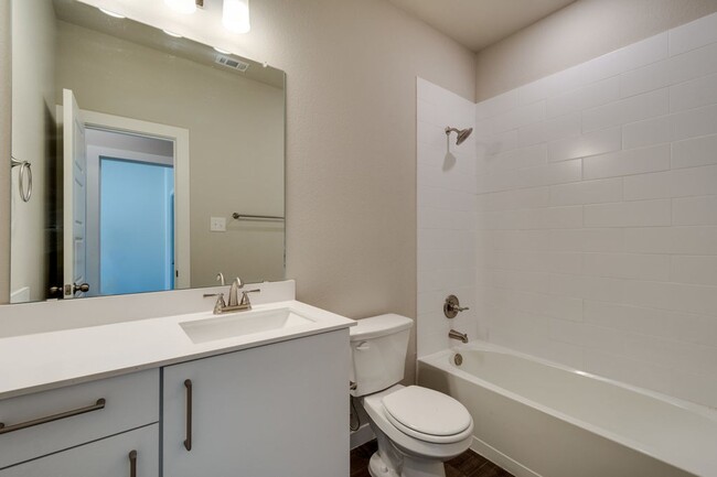Building Photo - GORGEOUS 3 BEDROOM FOUR PLEX LOCATED IN MI...
