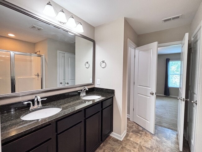 Building Photo - Modern 2-Bedroom Suite Home Near Hospitals...