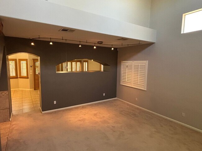 Building Photo - Gated Green Valley Ranch Townhome | 2 Bed | 2.5 Bath | 2-Car Garage
