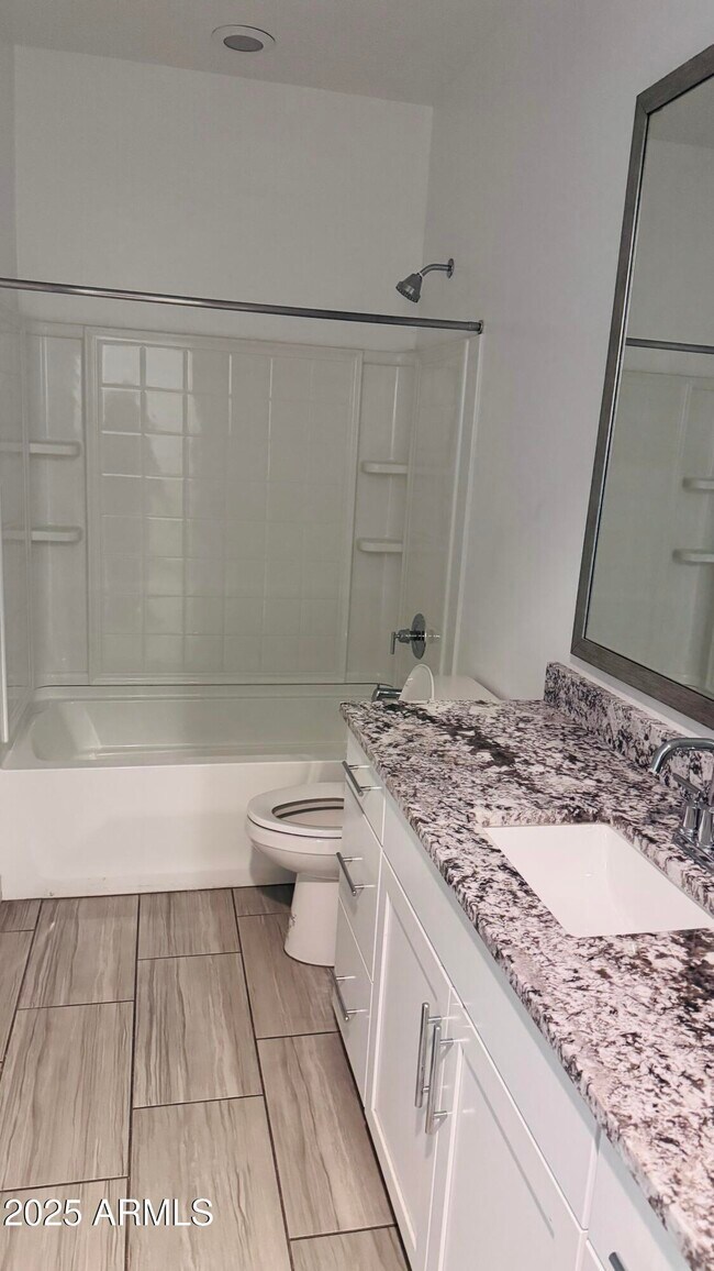 Building Photo - 9118 W Sells Dr