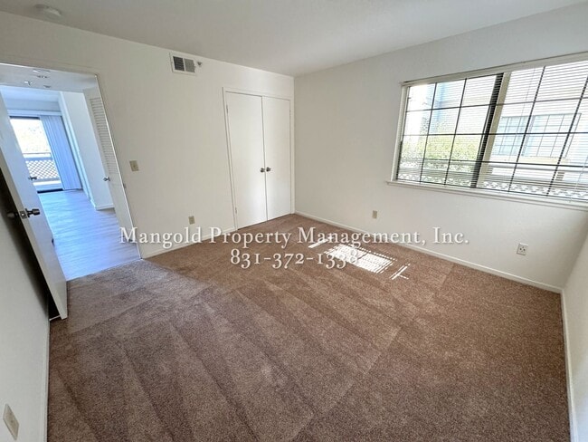Building Photo - Spacious 2-Bed, 2-Bath Condo with Fireplac...