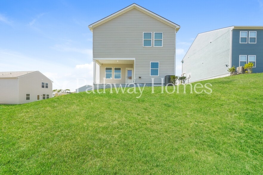 Building Photo - 202 Wild Daisy Wy