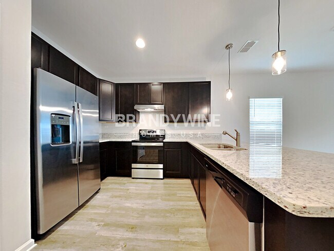 Building Photo - NEW Lower Rental Rate Leasing Special: Mar...