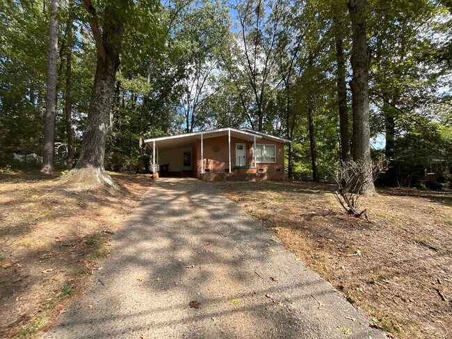 Building Photo - Reduced to $1550/mo! N Central Greensboro location, 3/2 brick home with lots of shade, fresh paint!