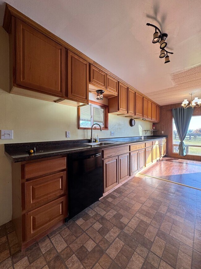 Building Photo - Spacious Pet-Friendly Rental on 3 Acres — ...