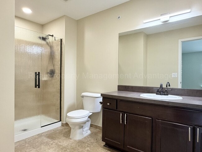 Building Photo - Rare Corner Upper Condo with Vaulted Ceilings, Private Balcony and 2 Car Garage - Right Across fr...