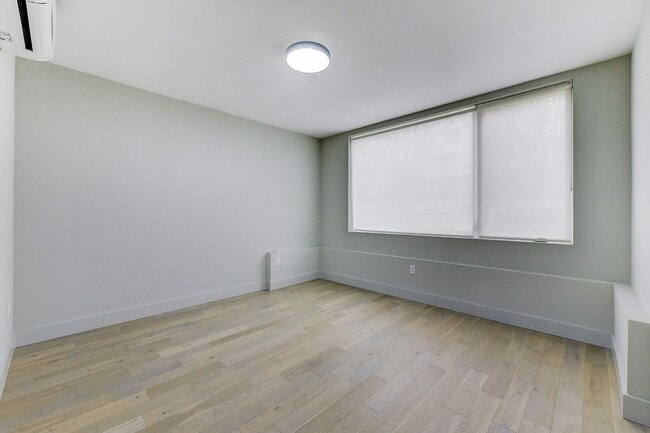 Building Photo - Smart Layout, Prime Location, and a Rooftop That Seals the Deal