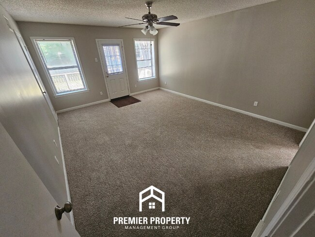 Building Photo - Stunning 3BR/2BA Home | 1,644 Sq Ft, Floor-to-Ceiling Stone Fireplace & High Ceilings