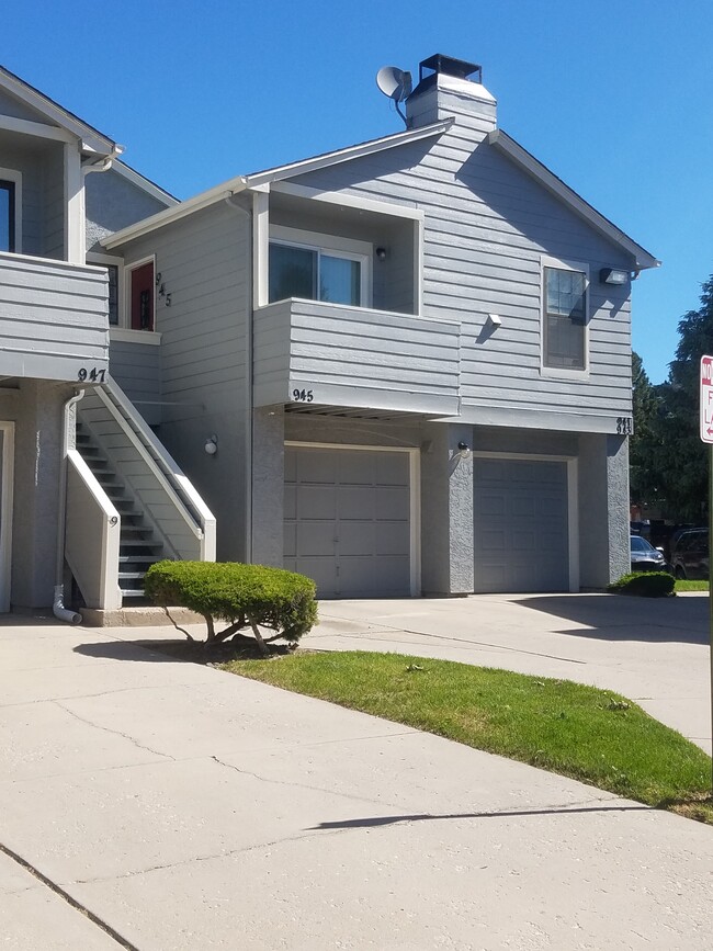 Second floor unit with balcony. Garages belong to downstairs neighbors. - 945 Tampico Court