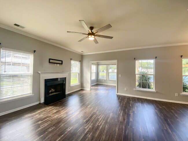 Building Photo - Three Bedroom Home with fenced-in Backyard...