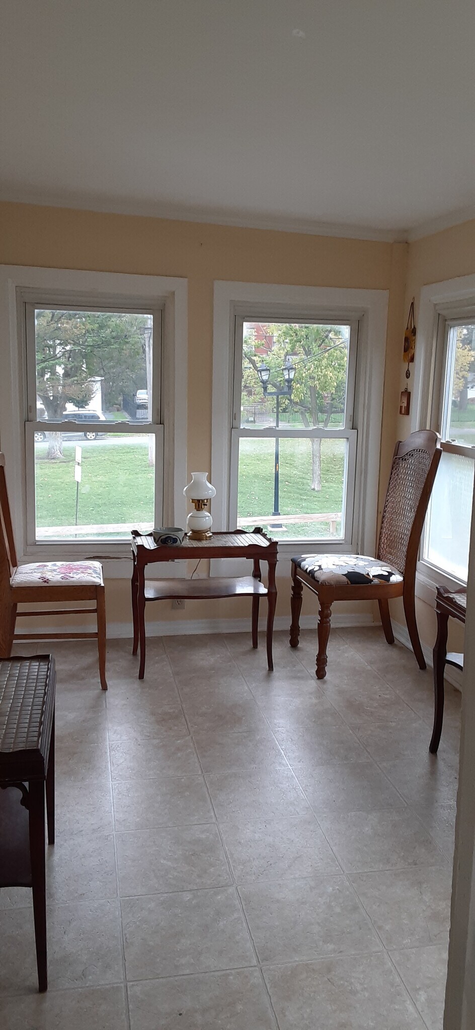 Enclosed porch with view of the park - 715 N McBride St