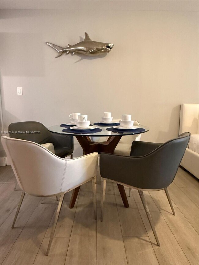 Building Photo - 6755 Harding Ave