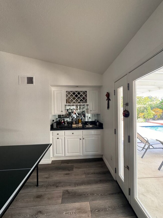 Building Photo - BEAUTIFULLY Updated Home with Pool+ Modern...