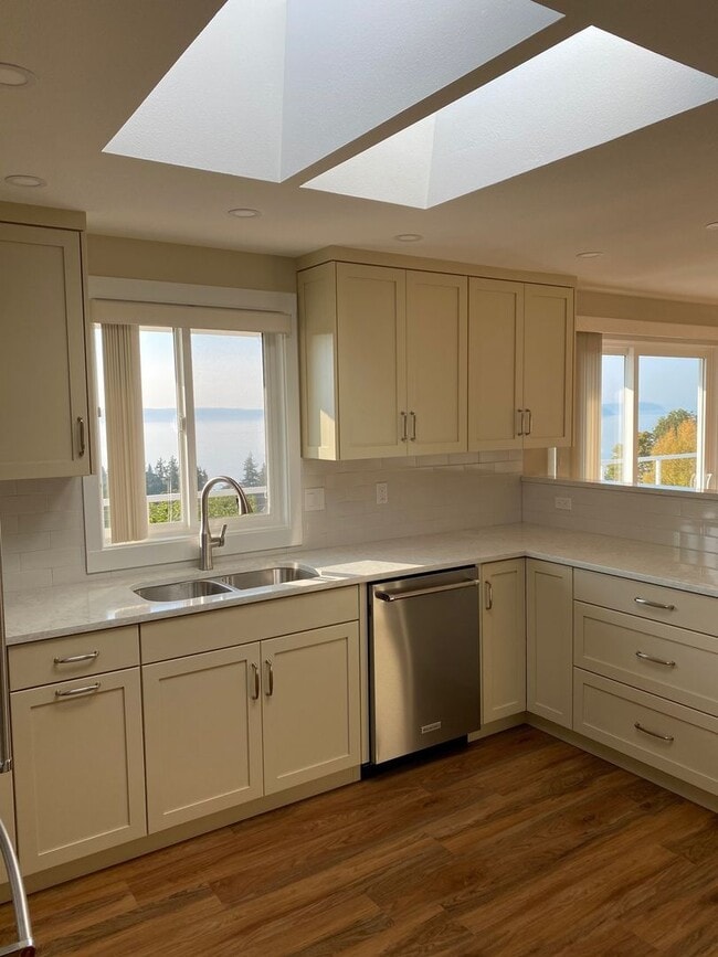 Building Photo - Modern 4-Bedroom Home with Panoramic Water & Mountain Views