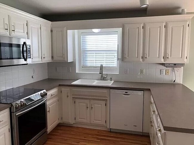Building Photo - Spacious 4-Bedroom Greenwood Home with Vau...