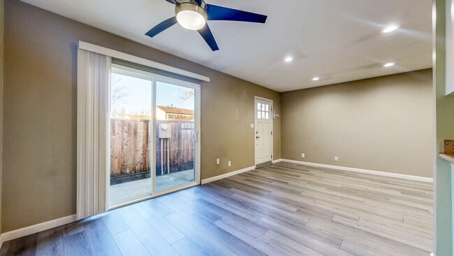 Building Photo - Cozy 1 bedroom 1 bath end unit condo with 1 car garage and private patio located next to Peterson...