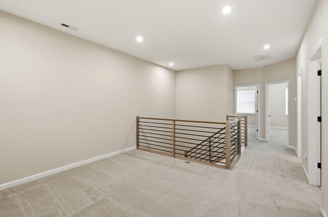 Building Photo - Like-New LoSo Townhome | 3BR + Loft | 2-Car Garage | Move-In Ready