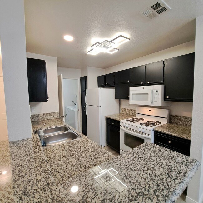 Building Photo - Spacious, Stylish Living in a Guard-Gated West Las Vegas Community in The Lakes with Resort-Style...