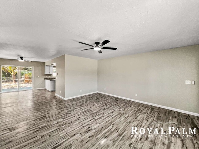 Building Photo - Tree-Lined 2BR/1BA Fort Myers Duplex with Fenced Yard, Storage Shed & In-Unit Laundry!