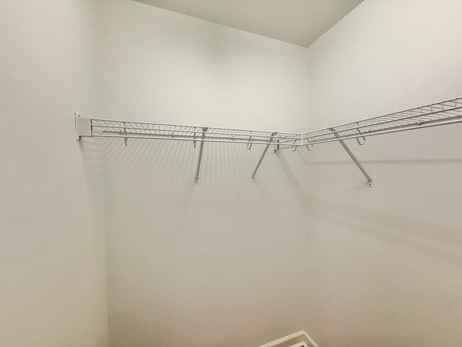 Building Photo - Modern 3BD, 2.5BA End Unit Raleigh Townhome with HOA Amenities Near I-540 & Triangle Town Center