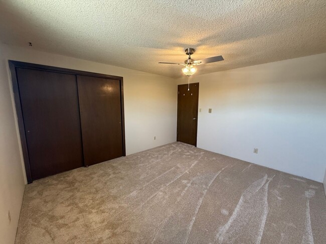 Building Photo - Two Bedroom, One and half bath townhome close to Regional West Medical Center.