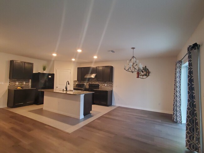 Building Photo - 6776 Wagon Trail St