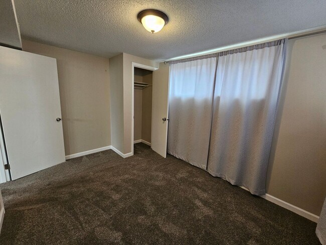 Building Photo - Welcome home to this maintained 4-bedroom, 2-bath Home in 80909!