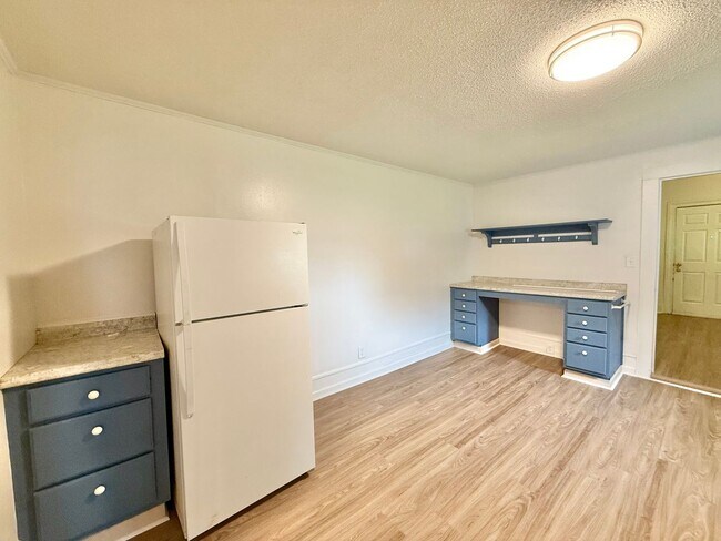 Building Photo - **OFFERING WAIVED APPLICATION FEES & $100 MOVE IN PROMOTION** Charming 3BD, 1BA Garner Condo Near...