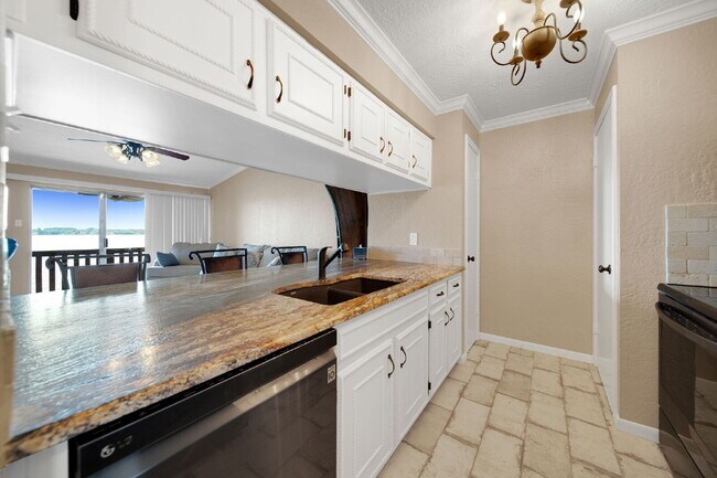 Building Photo - Welcome to your lakeside sanctuary in the ...