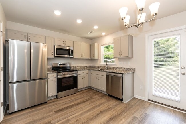 Building Photo - Modern Four Bedroom Home