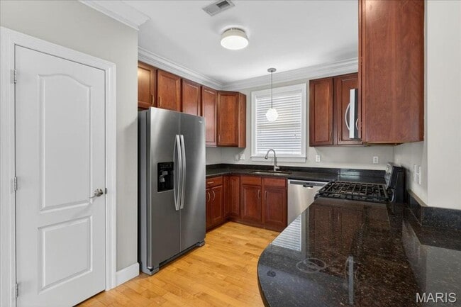 Building Photo - Welcome home to this bright and inviting 2-bedroom, 2-bathroom apartment on the second floor at 7...