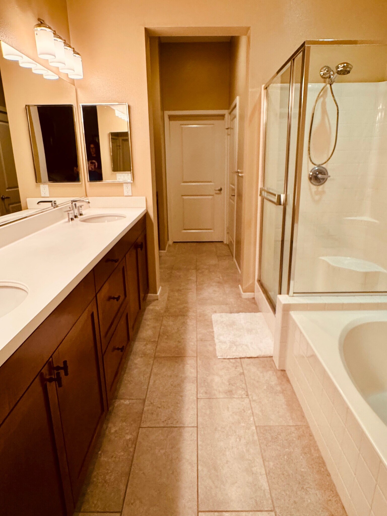 Master bath features dual, counter-height vanities, a soaking tub, a step-in shower, private WC, lin - 13019 Park Pl