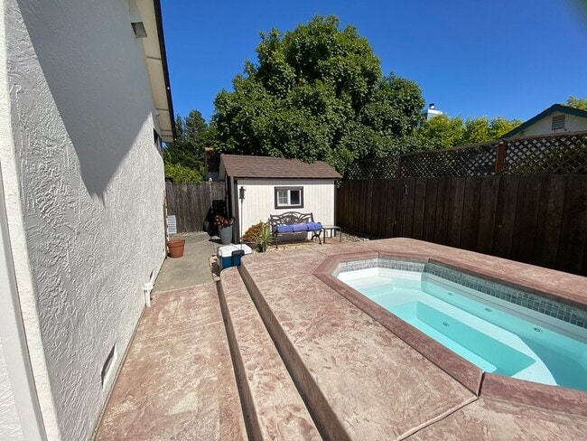 Building Photo - Stunning Home with Backyard Oasis with inground pool and spa