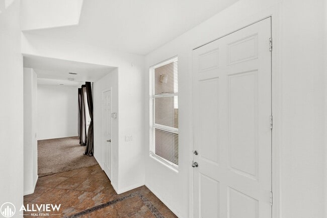 Building Photo - Spacious Coastal Condo with Rooftop Ocean ...