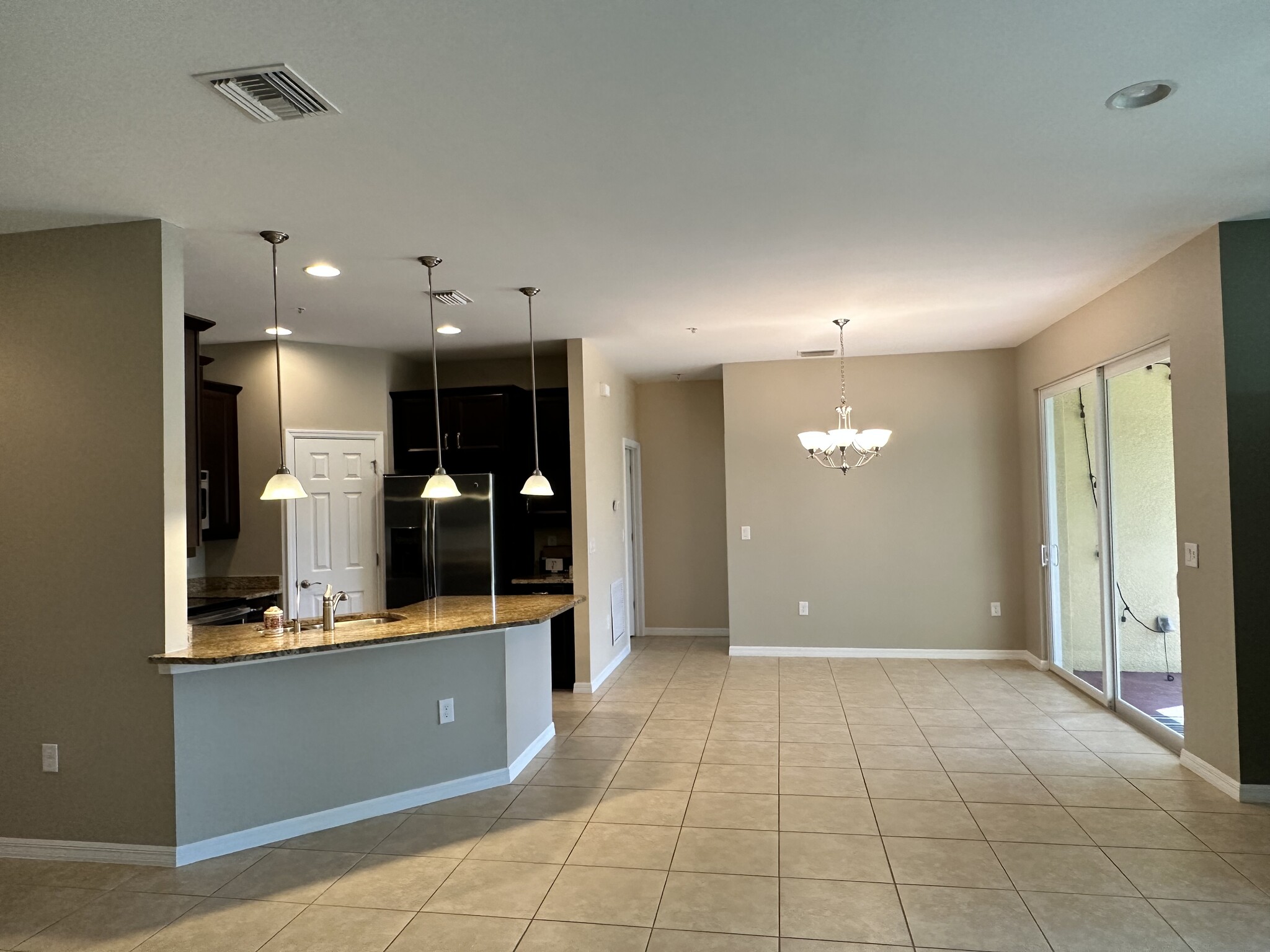 Spacious open dining /living room combo - 127 Explorer Dr