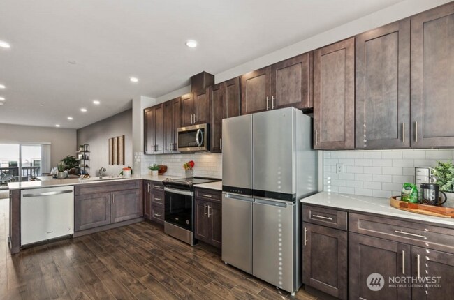 Building Photo - Modern Benton Square Townhome with Tandem 2-Car Garage + Flex Space