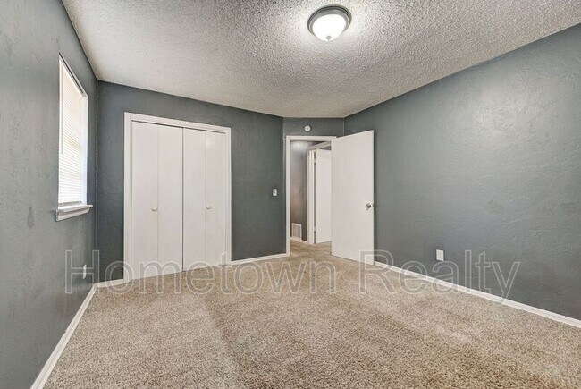 Building Photo - 8616 N Harvey Ave