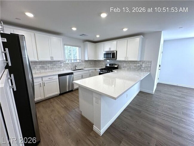 Building Photo - Stylish Gated Northwest Townhome with Open Living & Modern Finishes!