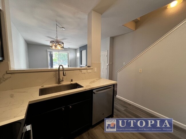 Building Photo - Recently Upgraded, Bi-Level Condo Downtown...